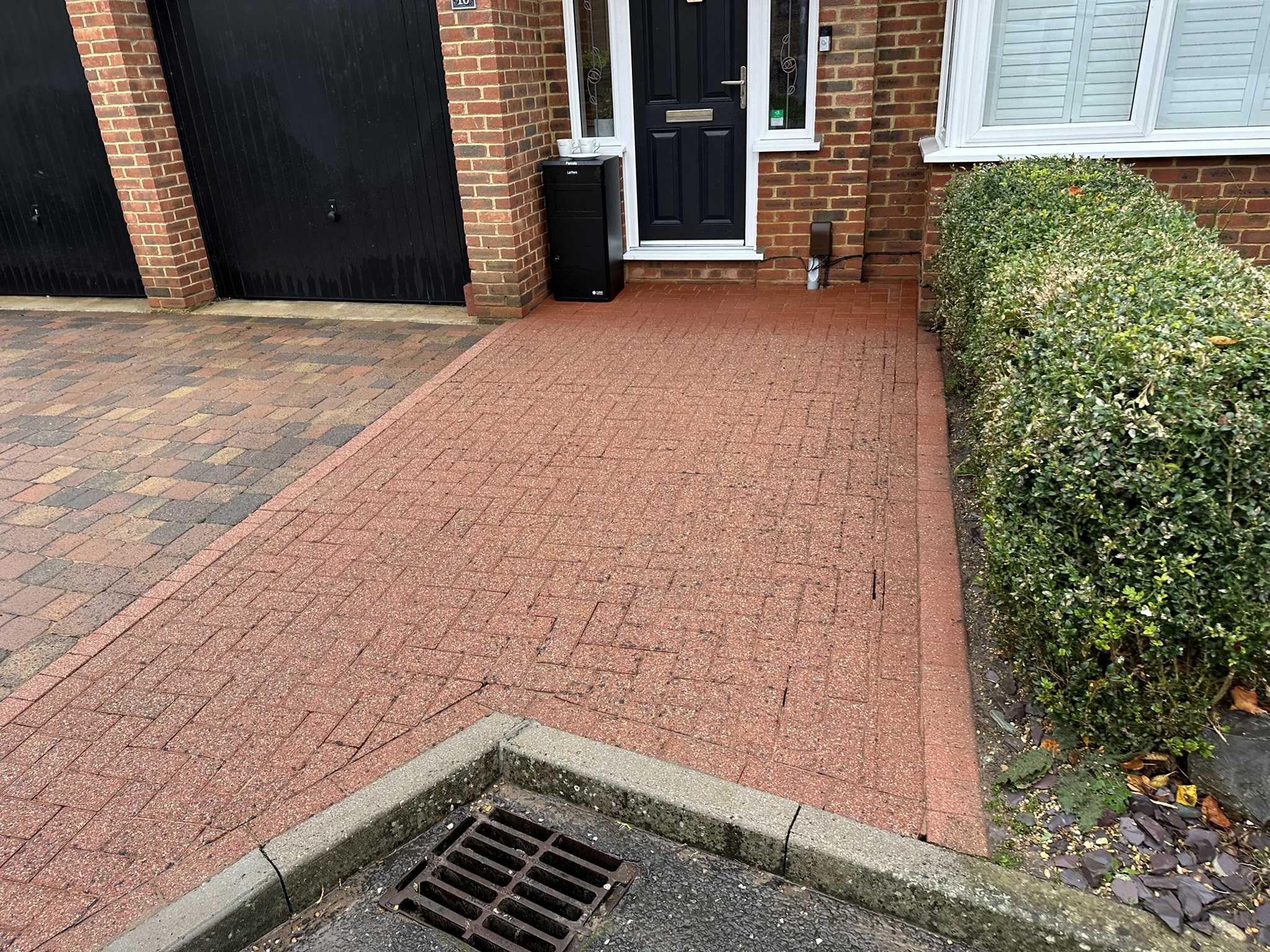 Driveway after pressure washing transformation – Marshall Window Cleaning