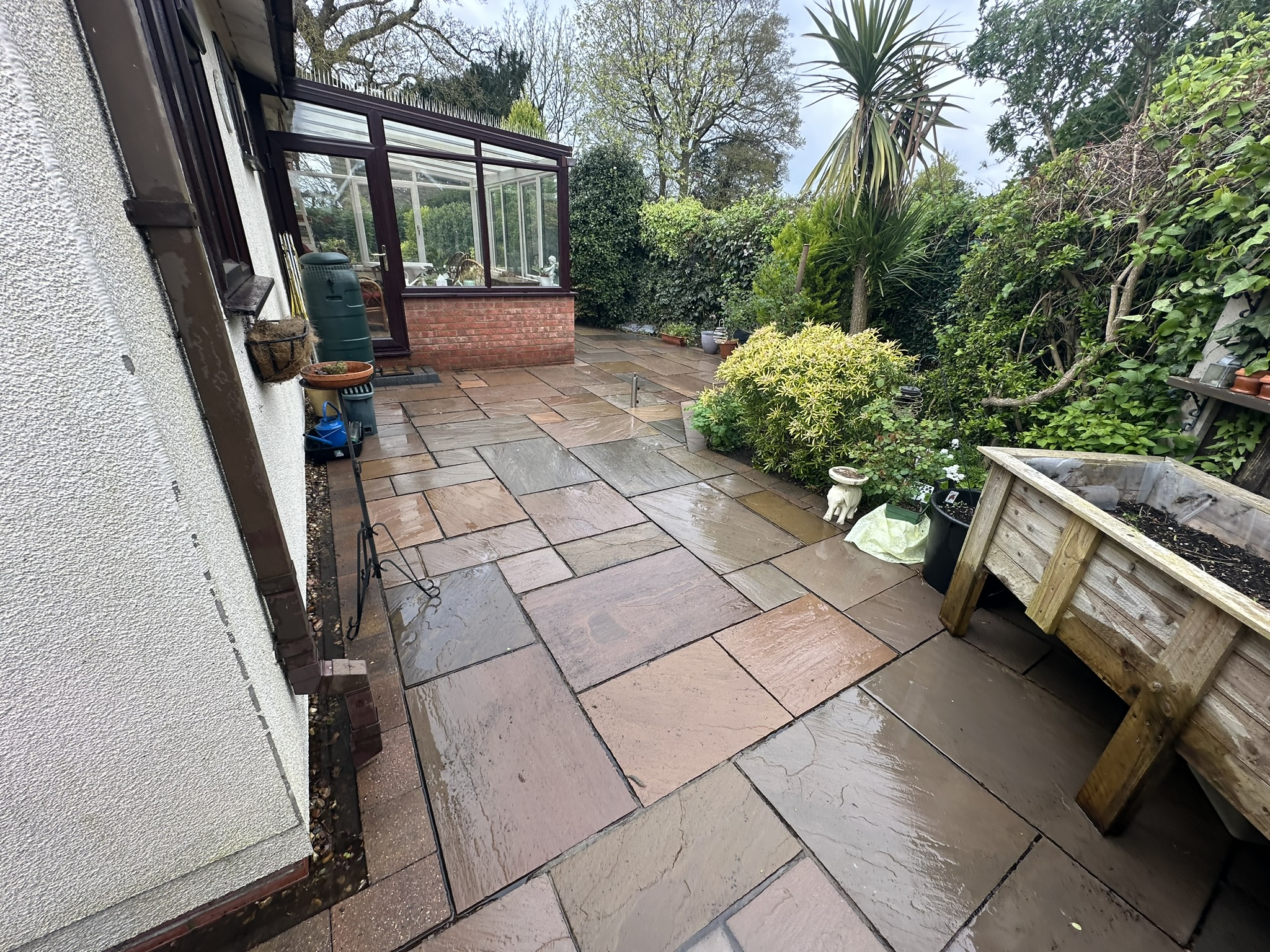 Driveway after pressure washing – before and after by Marshall Window Cleaning