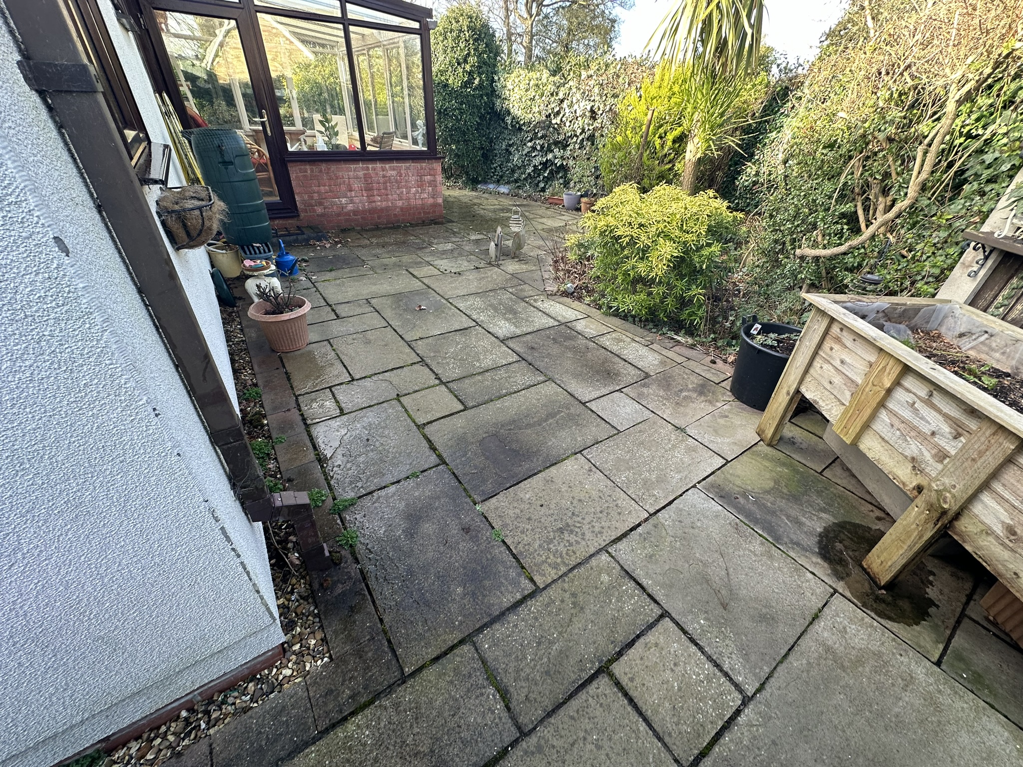 Driveway before cleaning – built-up grime and staining